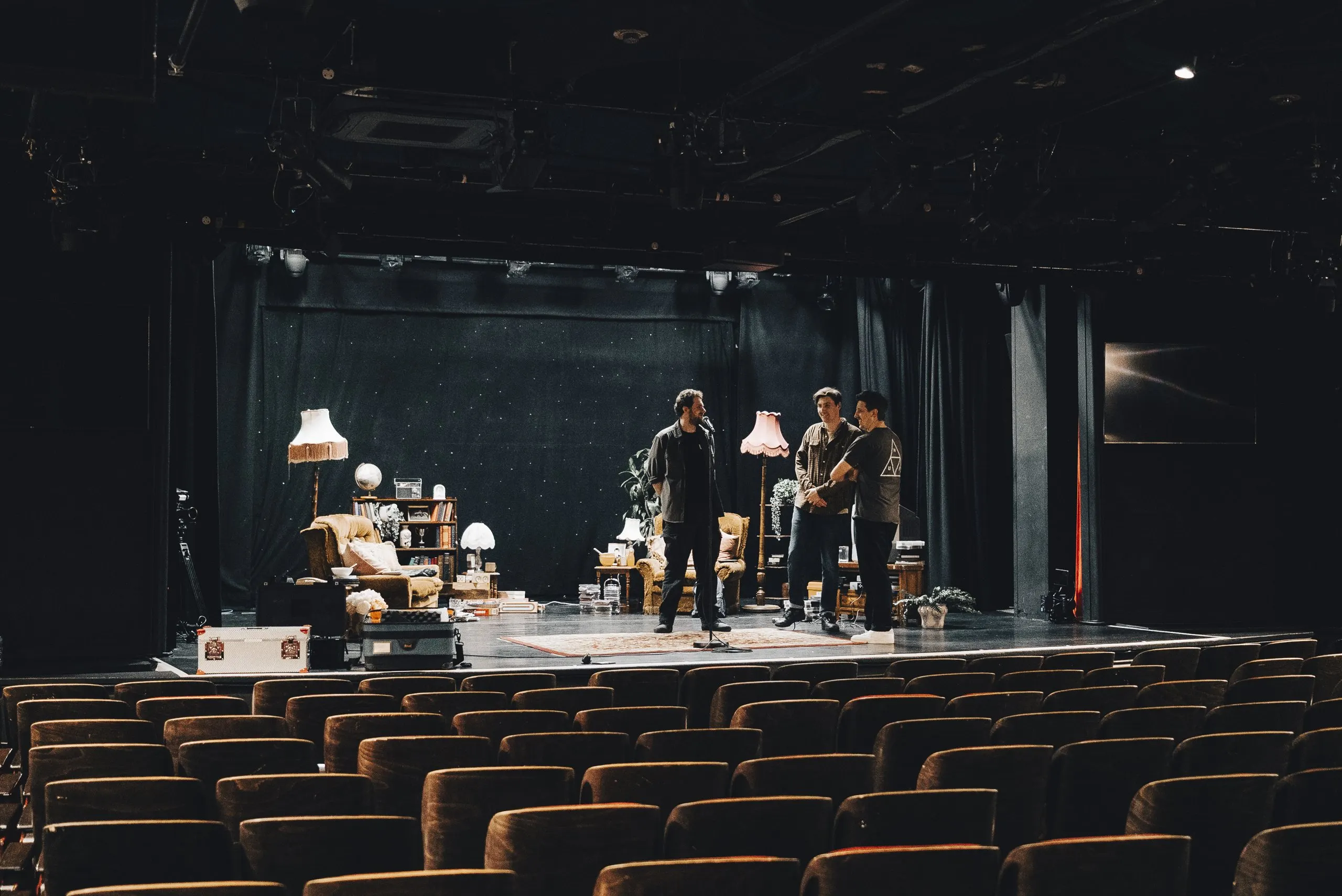 Alex Stockley, Sean McLoughlin and Mark G Smith on the finished White Elephant set, seen from the empty seats
